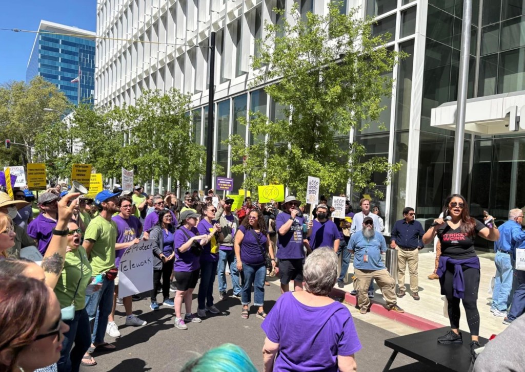 Members of different state unions rally in front of the Capitol Swing Space in downtown Sacramento