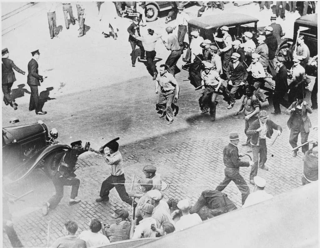 Police tangle with strikers on the streets of Minneapolis in 1934
